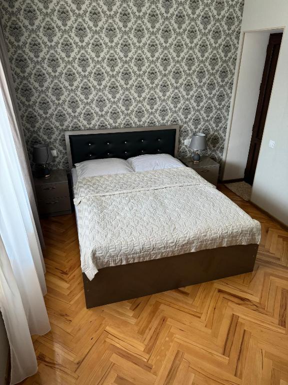 Postel nebo postele na pokoji v ubytování guest house TMT