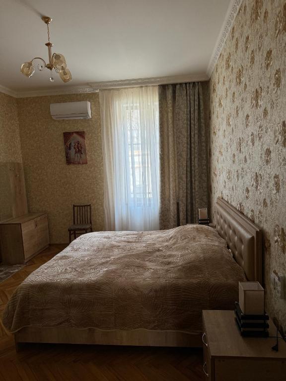 Postel nebo postele na pokoji v ubytování guest house TMT