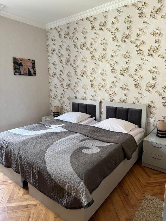 Postel nebo postele na pokoji v ubytování guest house TMT