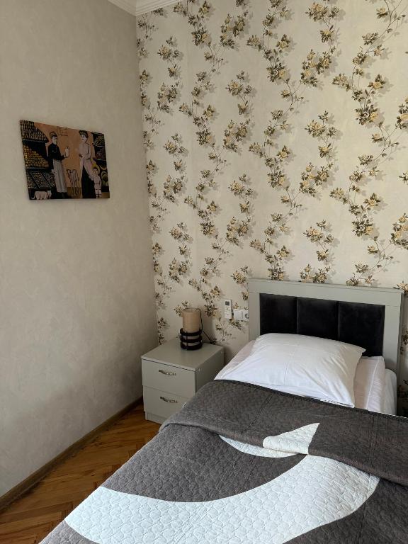 Postel nebo postele na pokoji v ubytování guest house TMT