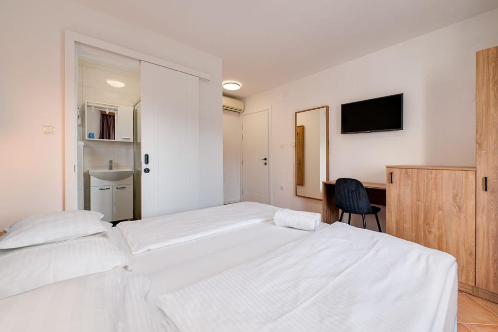 Postel nebo postele na pokoji v ubytování Bed & Breakfast Došen