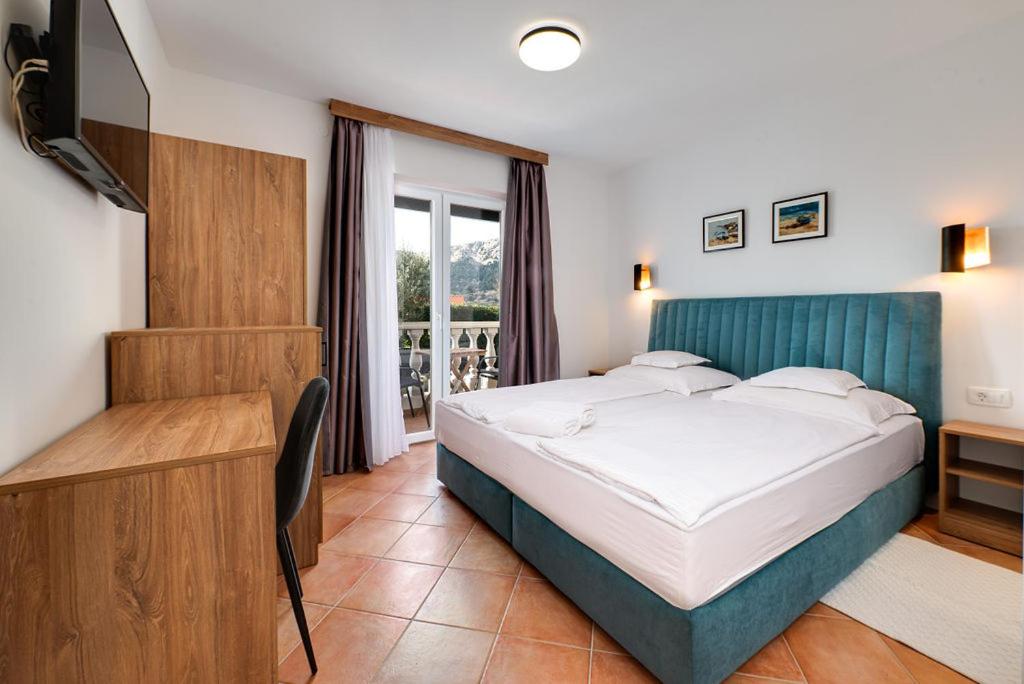 Postel nebo postele na pokoji v ubytování Bed & Breakfast Došen