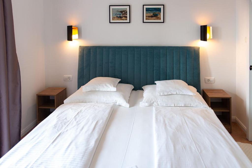 Postel nebo postele na pokoji v ubytování Bed & Breakfast Došen