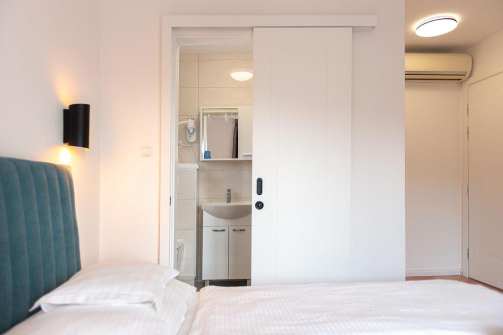 Postel nebo postele na pokoji v ubytování Bed & Breakfast Došen