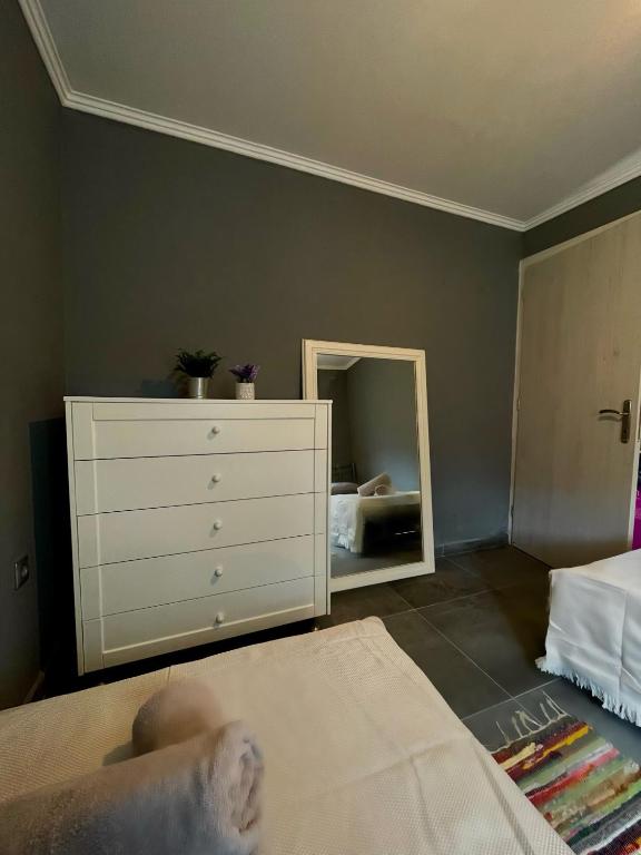 Postel nebo postele na pokoji v ubytování MK Residences