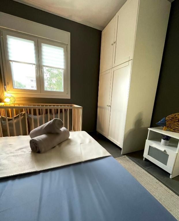 Postel nebo postele na pokoji v ubytování MK Residences