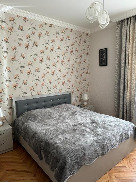 Postel nebo postele na pokoji v ubytování guest house TMT