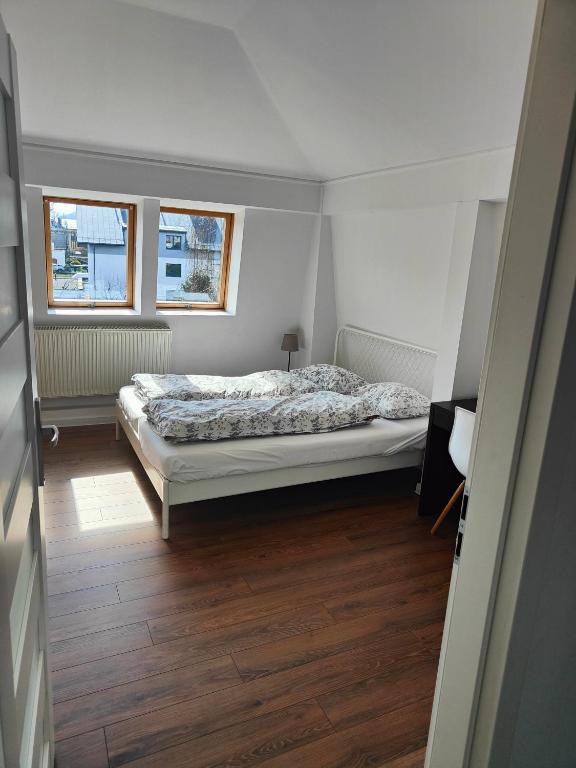 Posteľ alebo postele v izbe v ubytovaní Willa Kolor Pokoje Apartamenty Restauracja