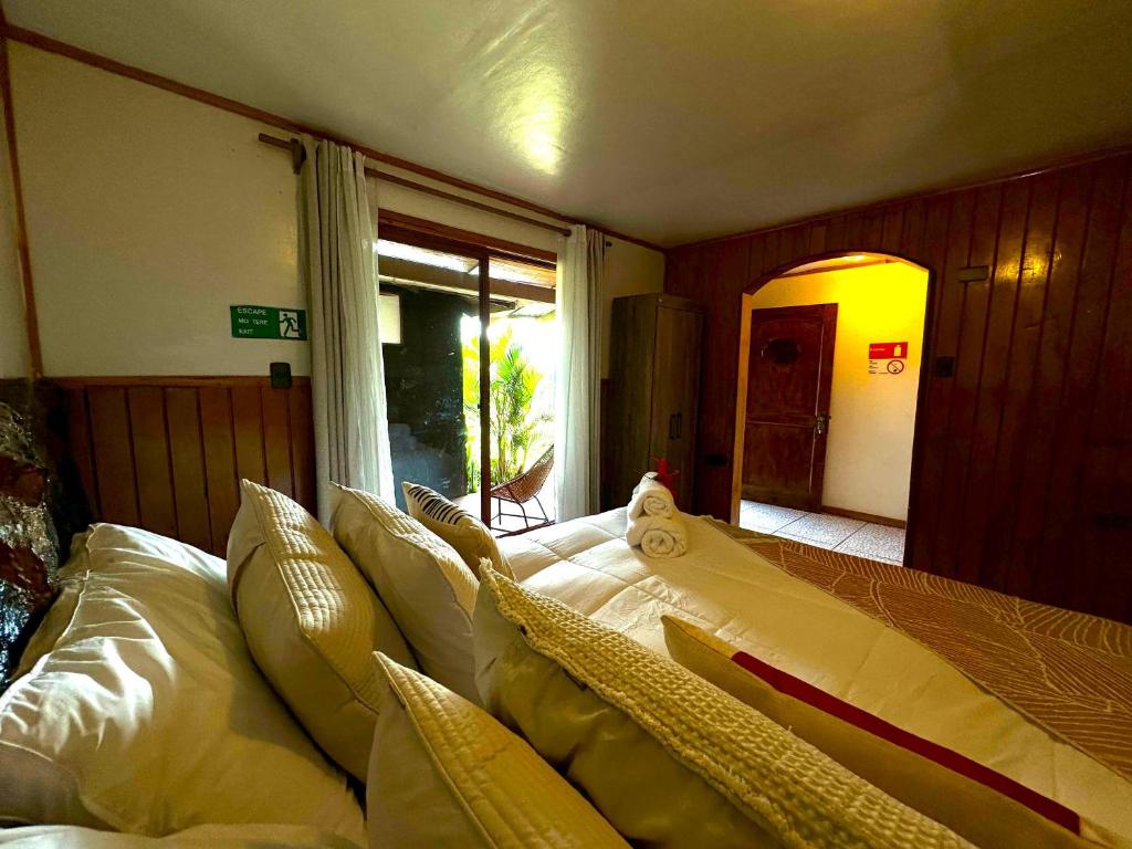 Posezení v ubytování PARAÍSO Sunset Bungalows