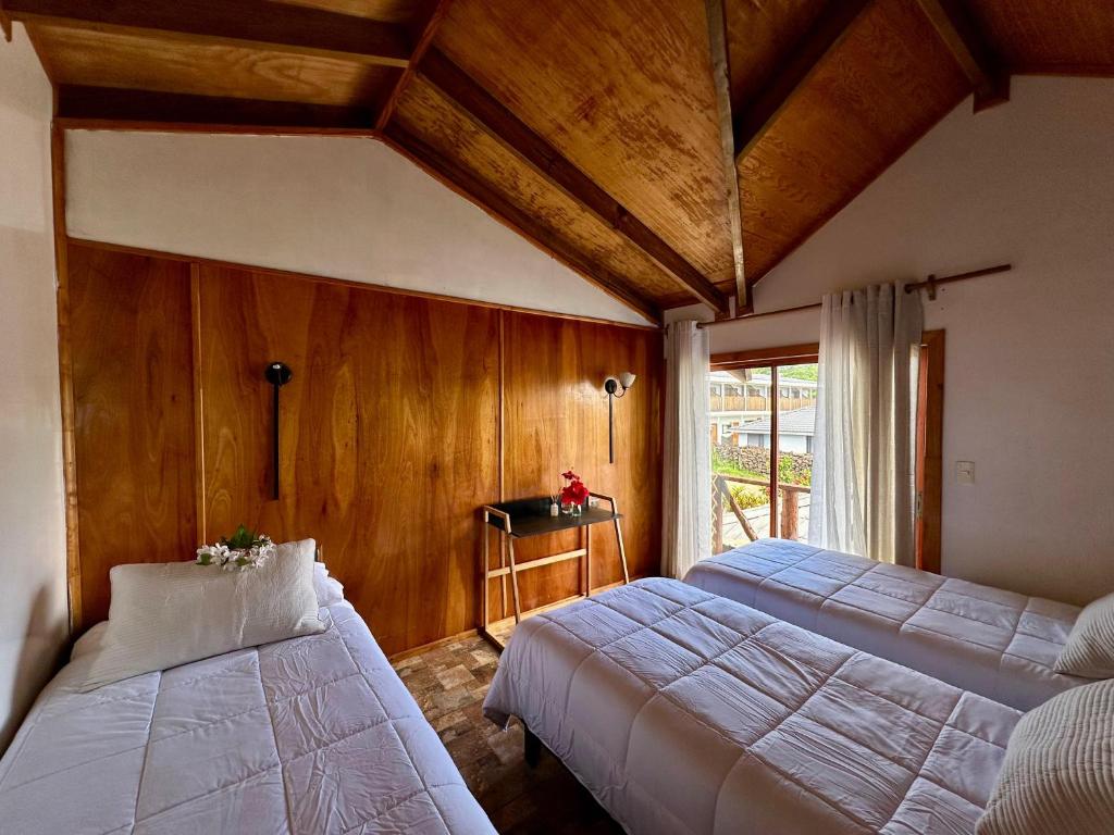 Postel nebo postele na pokoji v ubytování PARAÍSO Sunset Bungalows