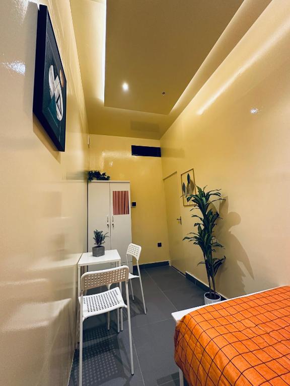 TV a/nebo společenská místnost v ubytování Sunrise Inn by DSV Property