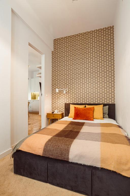 Posteľ alebo postele v izbe v ubytovaní Apartament na Krakowskim Kazimierzu