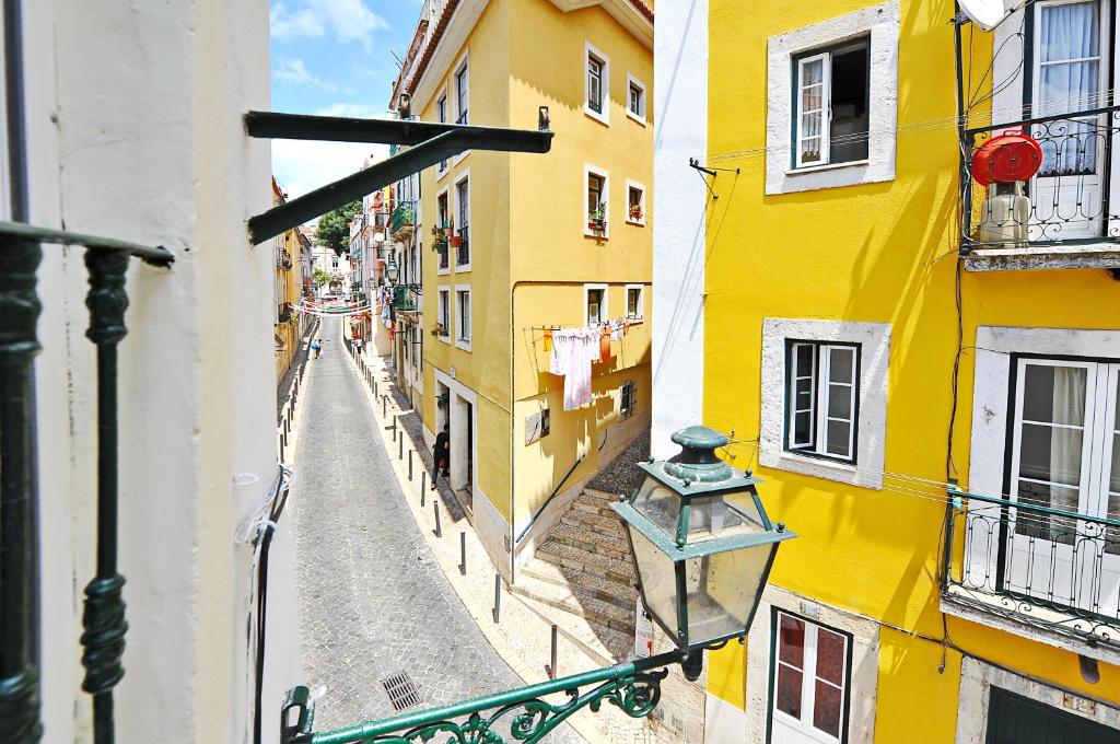 a view of an alley between two buildings at Suprema Loft II in Lisbon