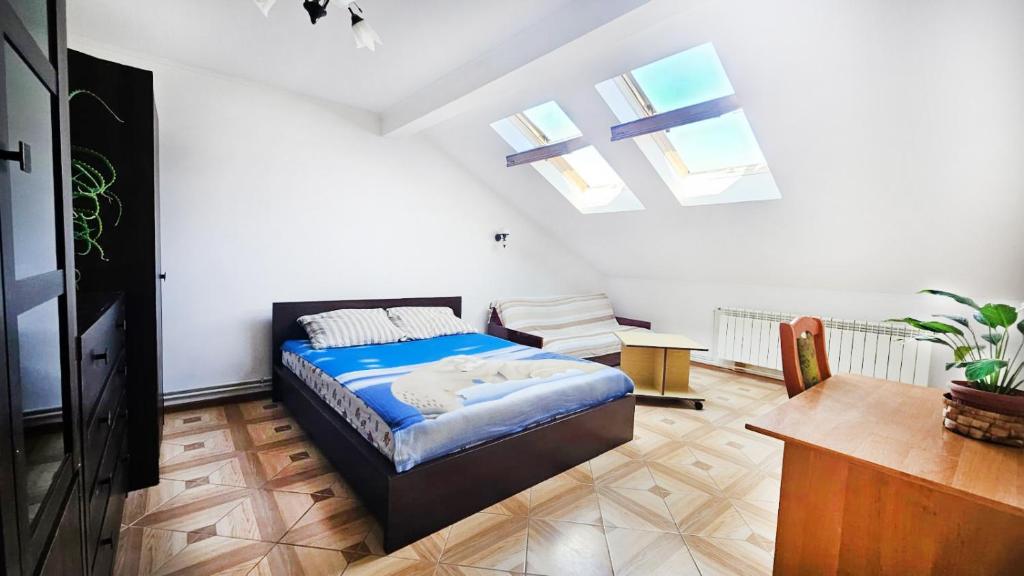 Postel nebo postele na pokoji v ubytování Relax Apartament Przemyśl