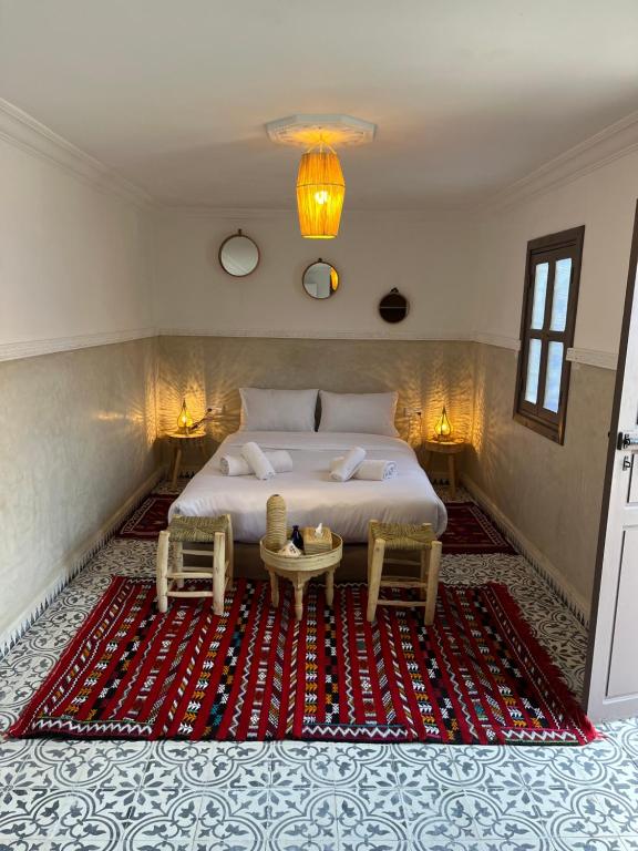 Postel nebo postele na pokoji v ubytování Riad Tarba & Spa