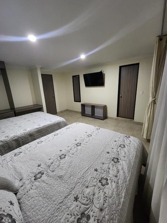 HOTEL CASA MARED Corferias-Embajada Americanaにあるベッド