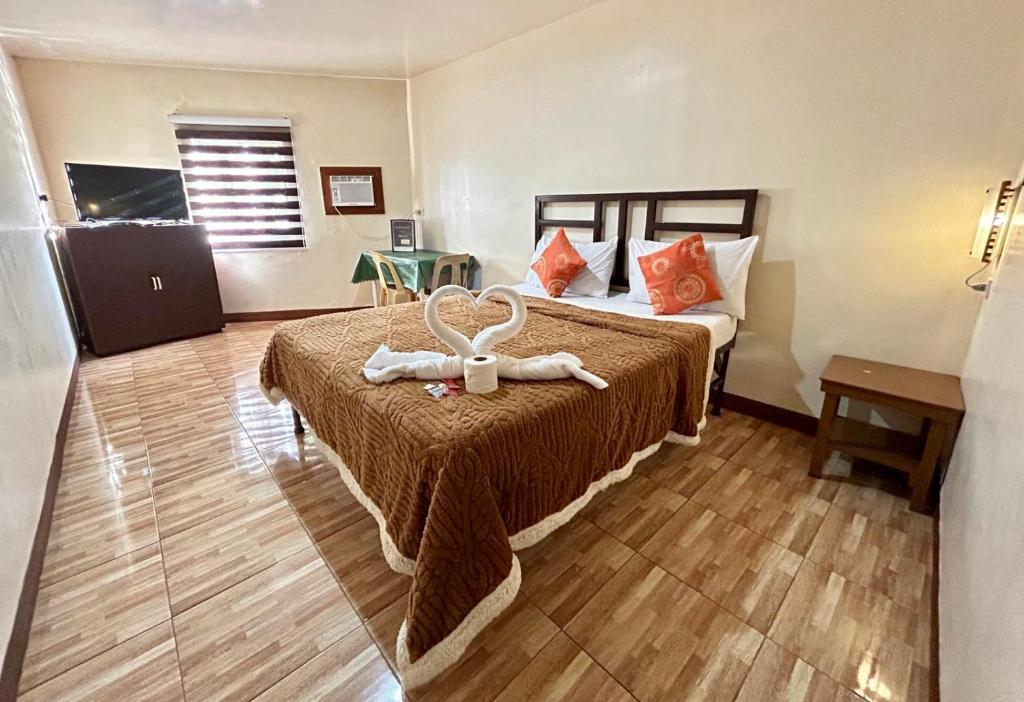 Postel nebo postele na pokoji v ubytování Elegance Guesthouse