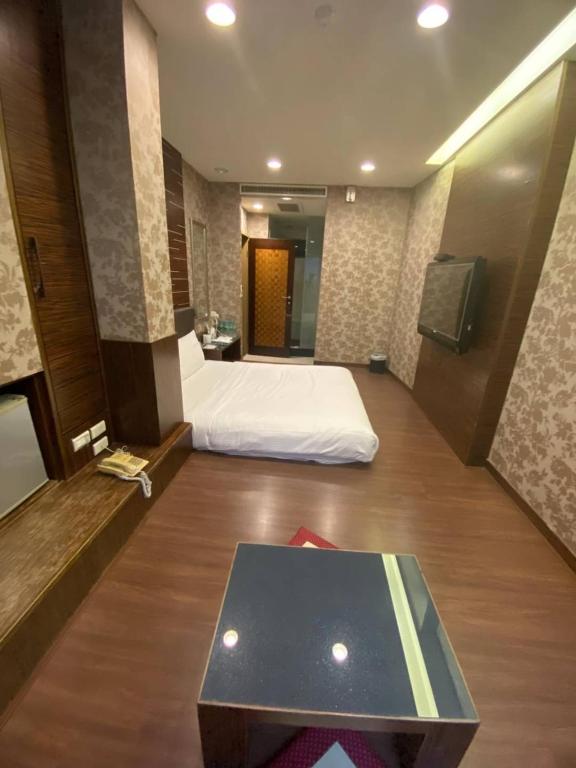Postel nebo postele na pokoji v ubytování Love Hotel