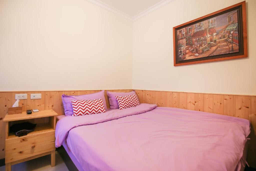Postel nebo postele na pokoji v ubytování 芹壁山莊