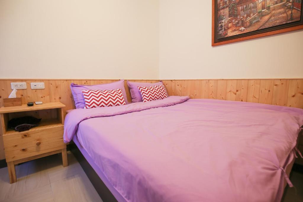 Postel nebo postele na pokoji v ubytování 芹壁山莊