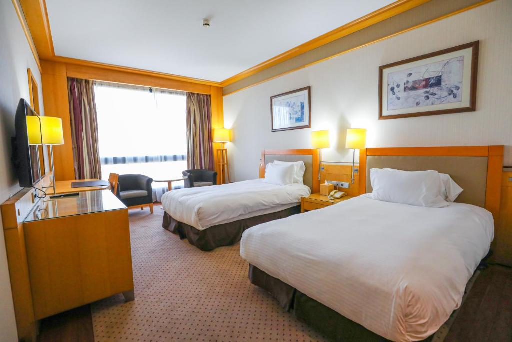 Postel nebo postele na pokoji v ubytování Crowne Plaza Hamra Beirut by IHG