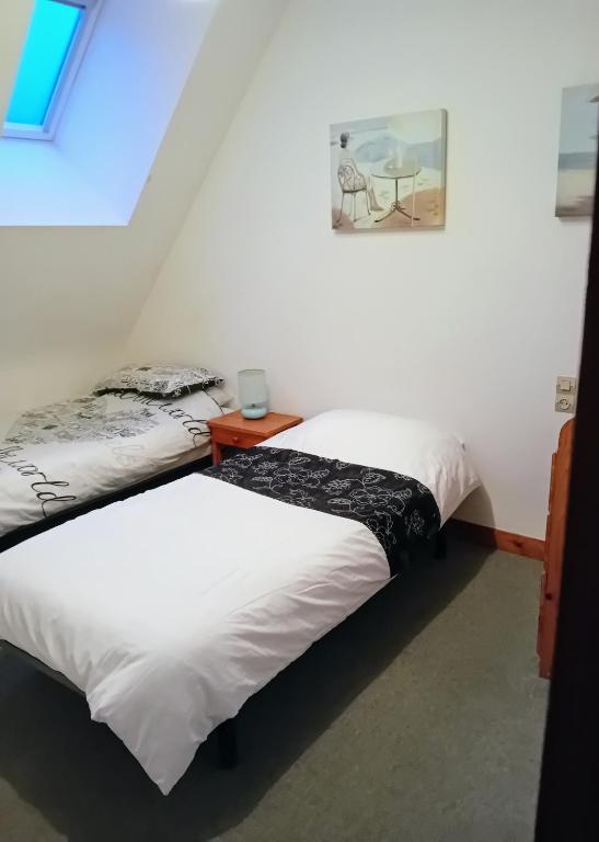 Postel nebo postele na pokoji v ubytování Caurelgranges
