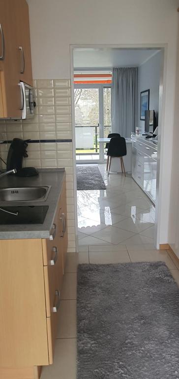 Kuchyň nebo kuchyňský kout v ubytování Ferienwohnung Charlie mit Seeblick