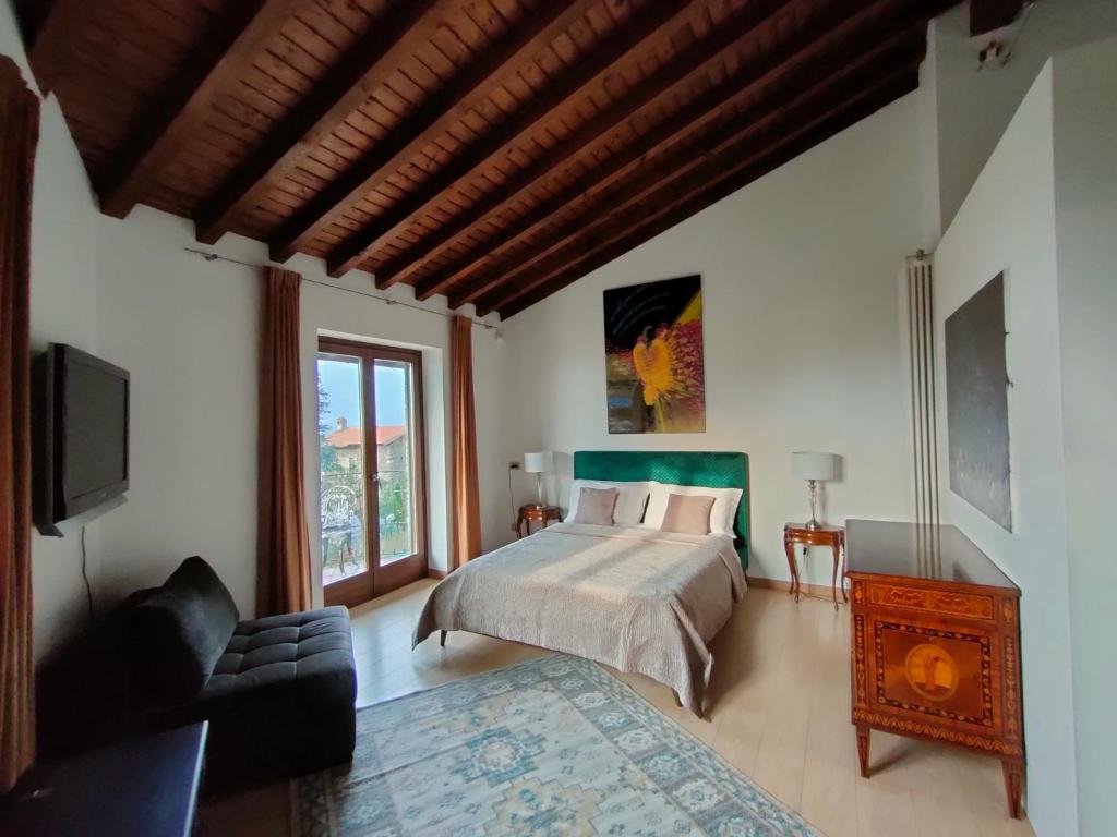 Postel nebo postele na pokoji v ubytování Suite with Lake Como view