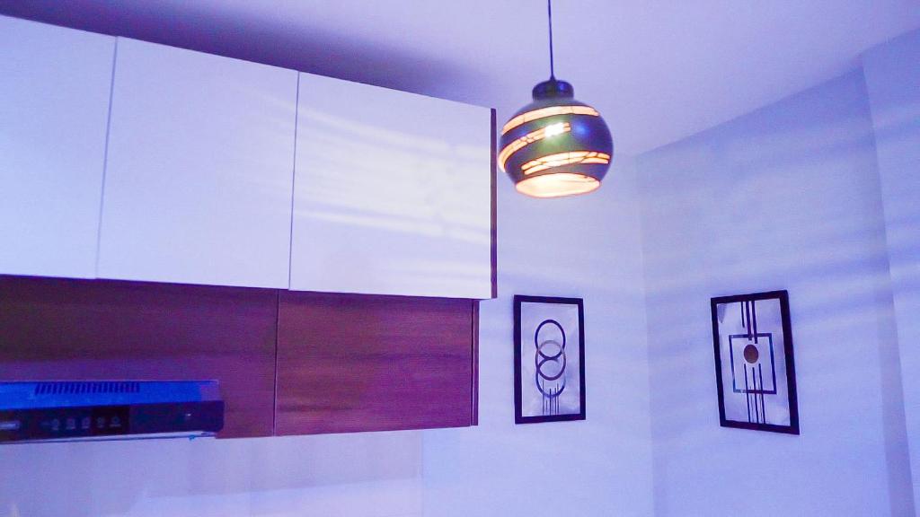 Kuchyň nebo kuchyňský kout v ubytování Cedarwood Apartments