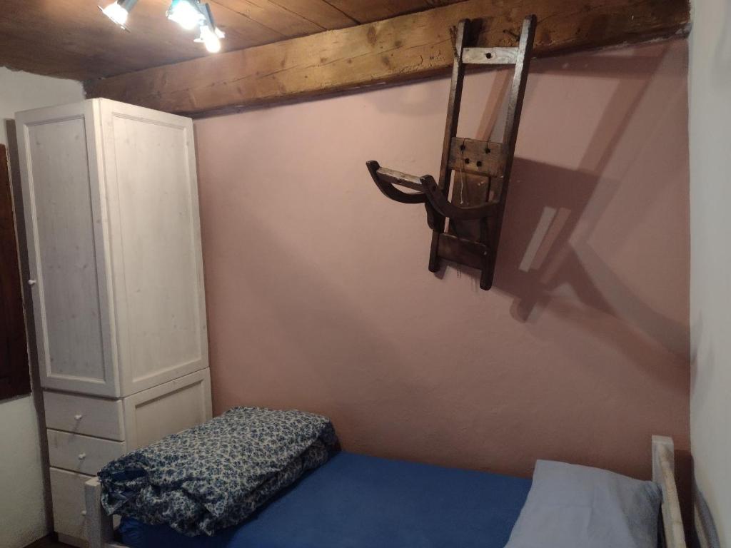 Postel nebo postele na pokoji v ubytování Rifugio Monte Zeus