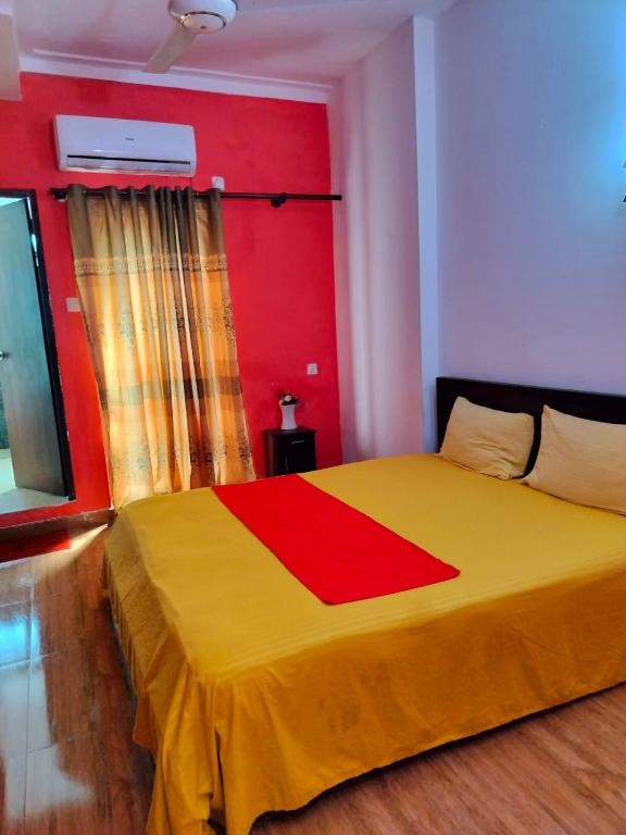 Postel nebo postele na pokoji v ubytování Solomon Villa