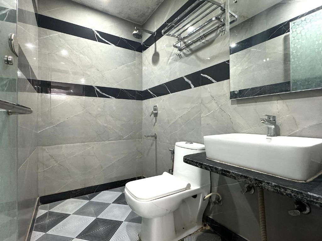 Koupelna v ubytování Hotel Kelson Dx with parking, 2mins from Metro Station near New Delhi Railway Station
