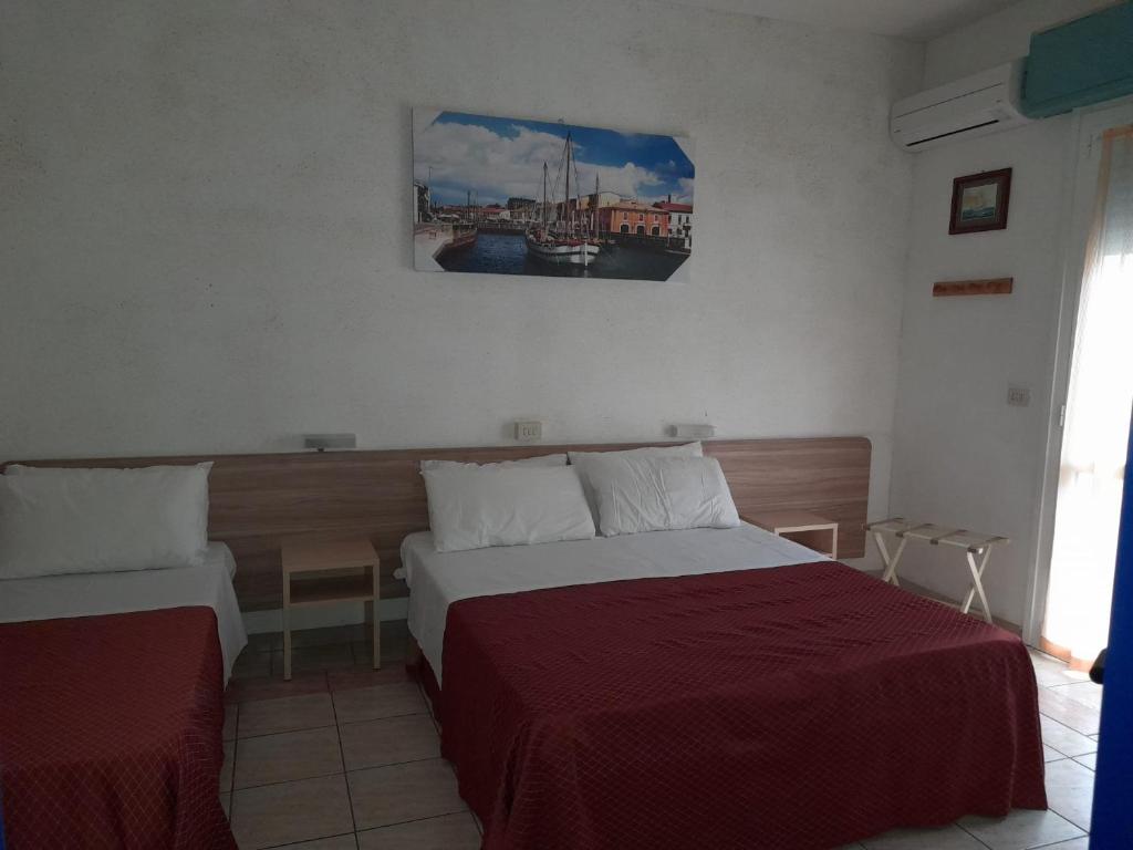 Postel nebo postele na pokoji v ubytování Hotel Antony