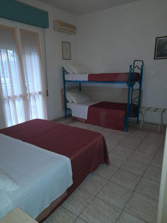 Postel nebo postele na pokoji v ubytování Hotel Antony