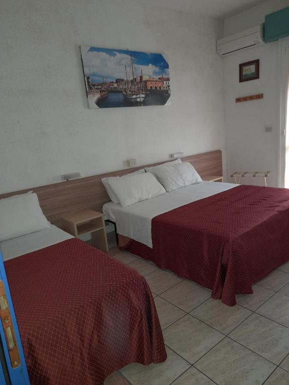 Postel nebo postele na pokoji v ubytování Hotel Antony