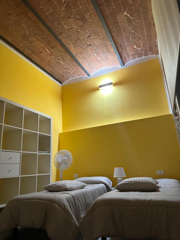 Posteľ alebo postele v izbe v ubytovaní Casa antica Maremma Toscana