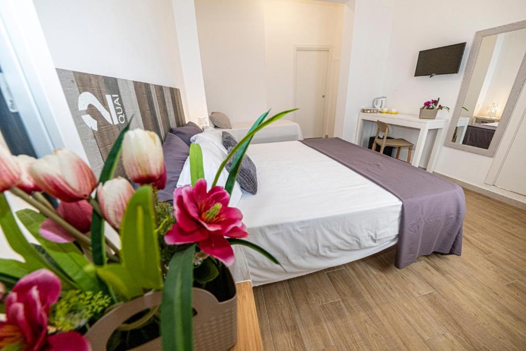 Postel nebo postele na pokoji v ubytování B&B - Le Tre Comari