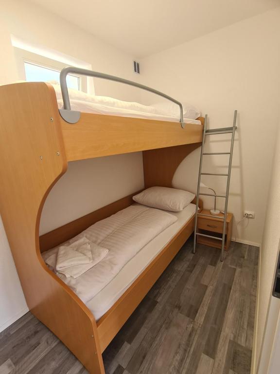 Postel nebo postele na pokoji v ubytování Počitniški dom Portorož / Portoroz Holiday Home