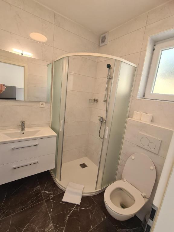 Koupelna v ubytování Počitniški dom Portorož / Portoroz Holiday Home