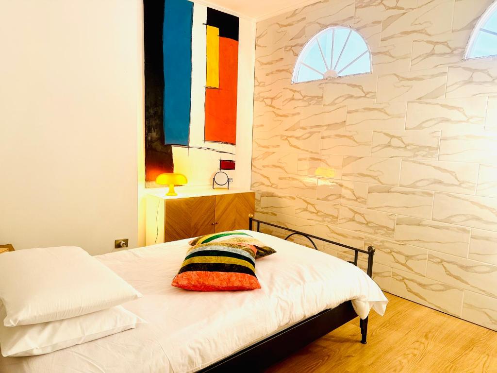 A bed or beds in a room at Casa Biondi