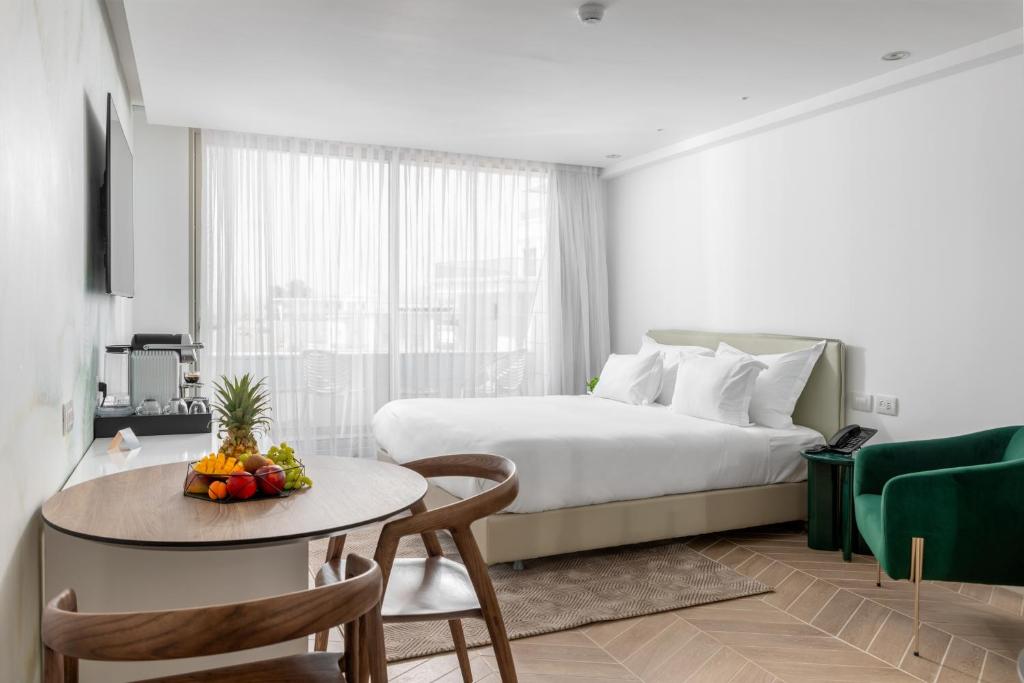 Postel nebo postele na pokoji v ubytování AKOYA HOTEL