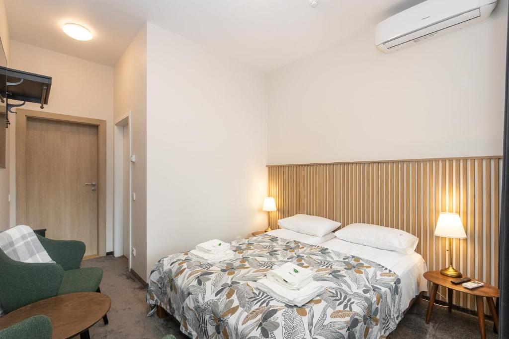 Postel nebo postele na pokoji v ubytování Moja Accommodation