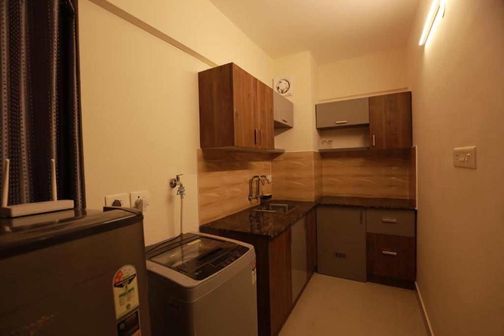 Kuchyň nebo kuchyňský kout v ubytování VVP SERVICE apartment