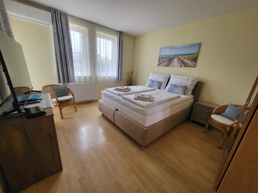 Postel nebo postele na pokoji v ubytování Villa Nova