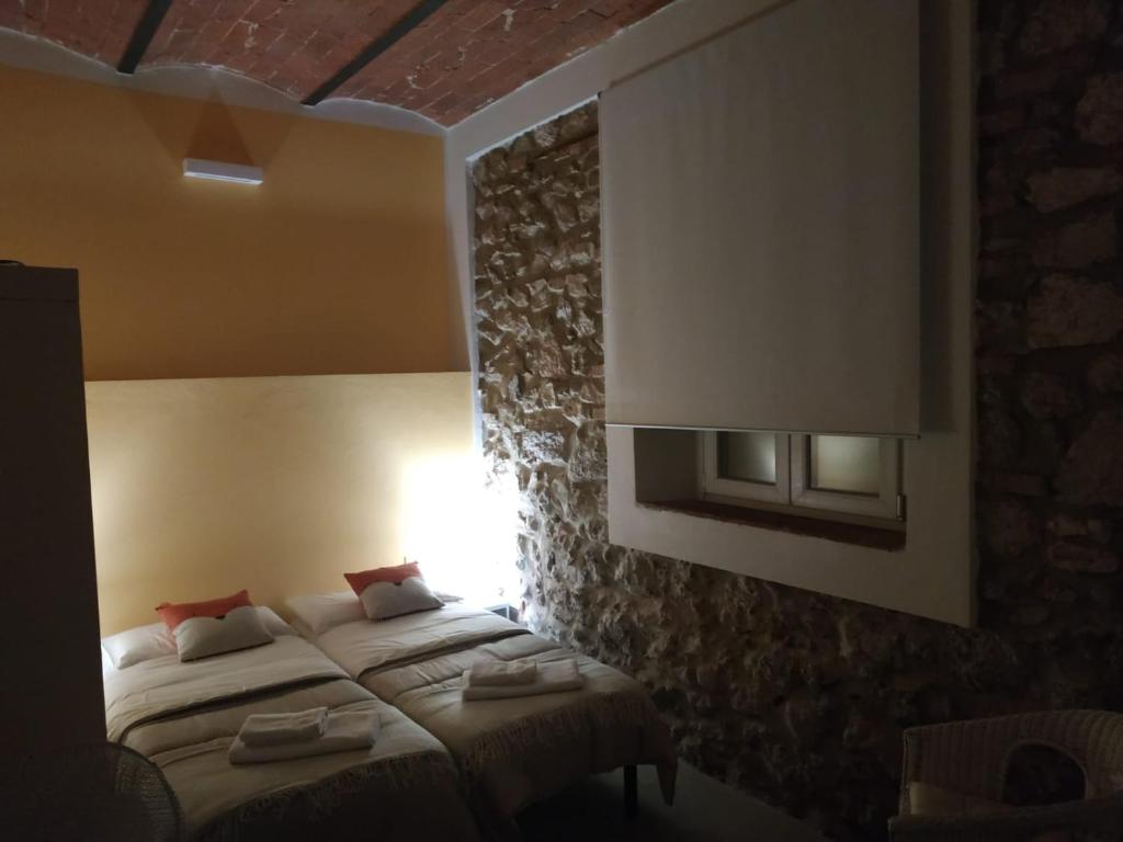 Posteľ alebo postele v izbe v ubytovaní Casa antica Maremma Toscana