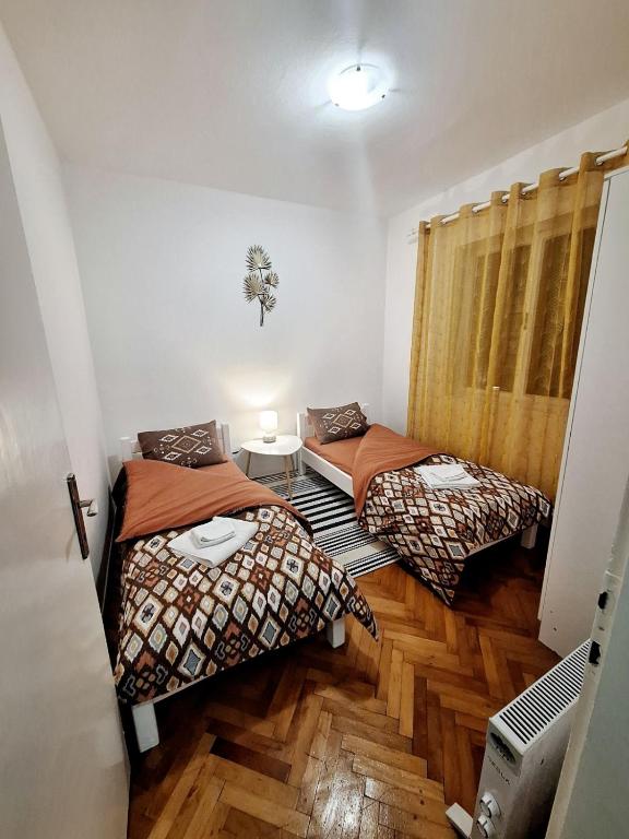 Voodi või voodid majutusasutuse Red House Apartment toas