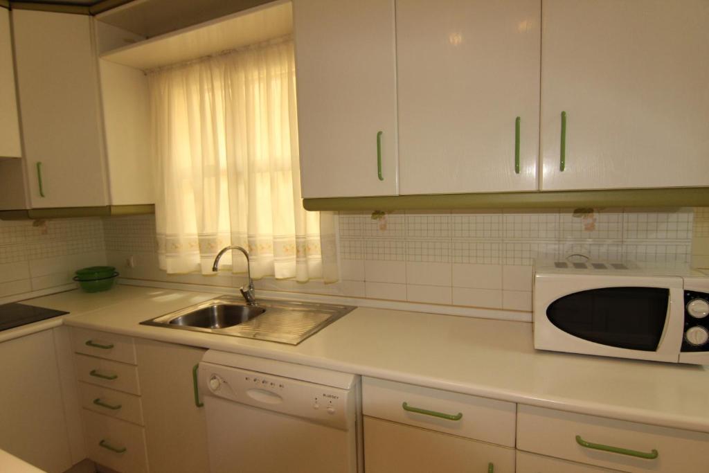 Kuchyňa alebo kuchynka v ubytovaní Apartamento Paola