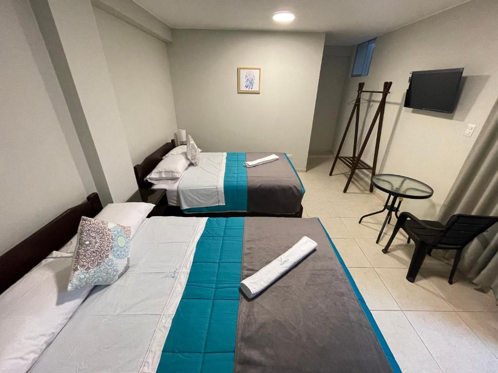 Postel nebo postele na pokoji v ubytování Vianca Hotel