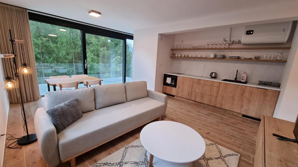 Kuchyň nebo kuchyňský kout v ubytování Chalets Hrabovo