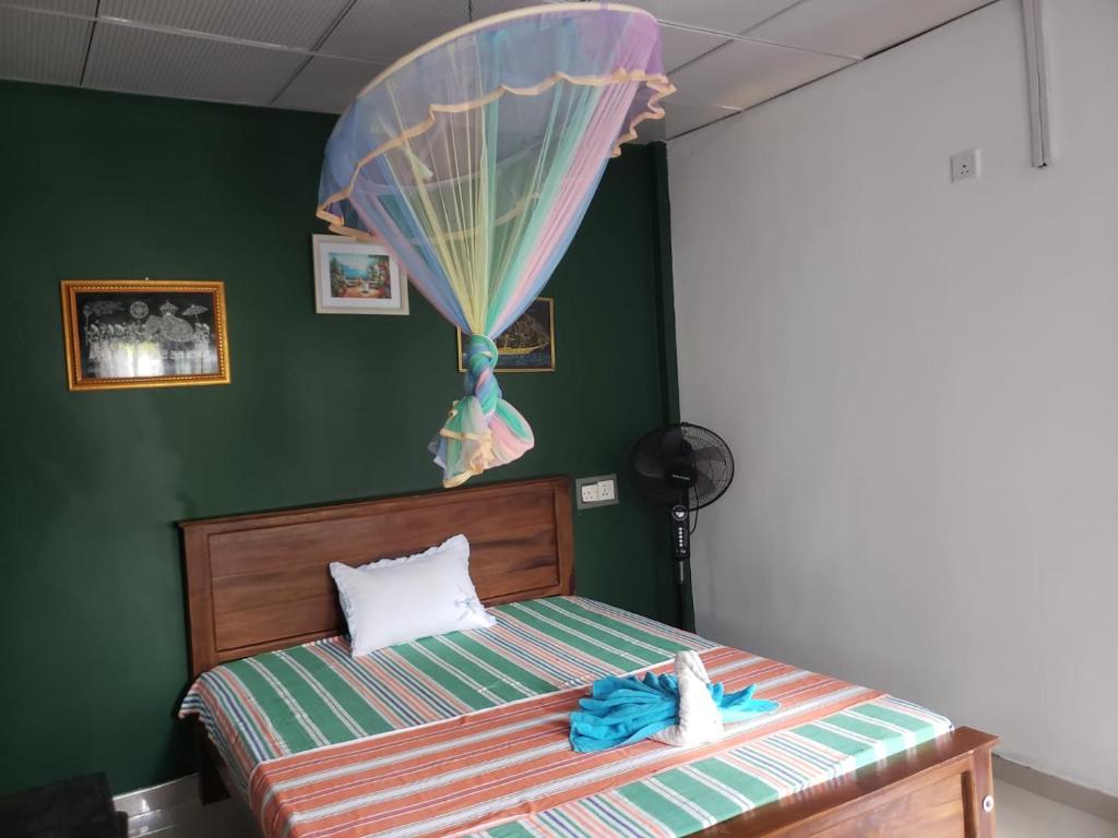 Postel nebo postele na pokoji v ubytování Tiny Homestay